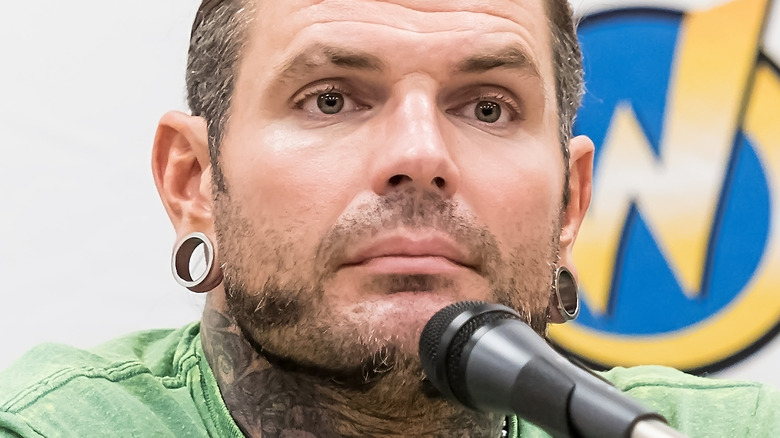 Jeff Hardy sitting near microphone
