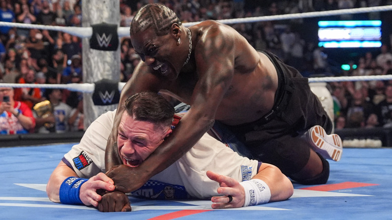 Ron Killings putting John Cena into an STFU during an episode of 