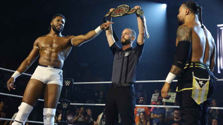 Trick Williams squaring off with TNA's Mike Santana during their match on 