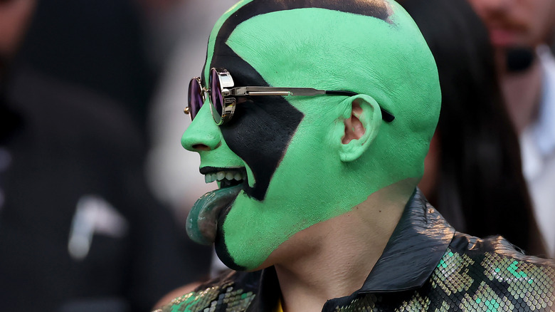 Mr. Igauan wearing green and black face paint