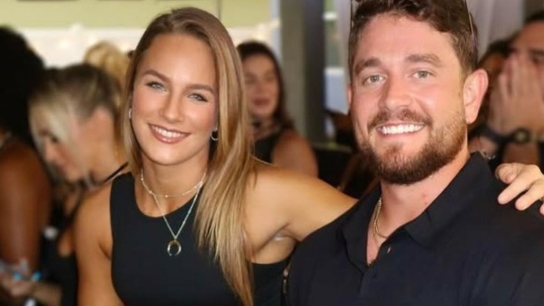 Fallon Henley sits next to boyfriend Philip Dyer in a photo posted to his Instagram account.