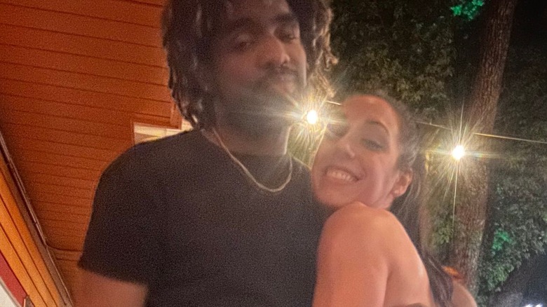 Jacy Jayne hugs boyfriend Troy Hollywood in a photo posted to his X account.