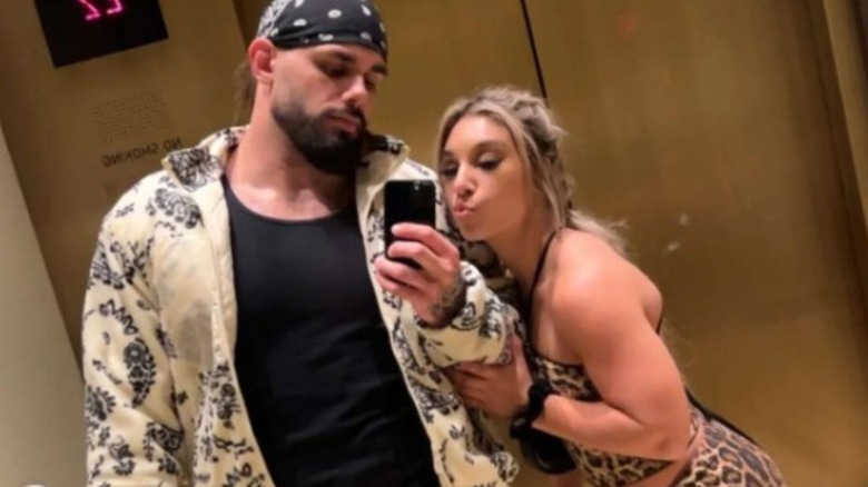 Thea Hail and Harlem Lewis pose together in a mirror photo from an elevator posted to Instagram.
