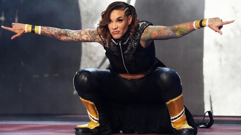 Mercedes Martinez in a crouched position