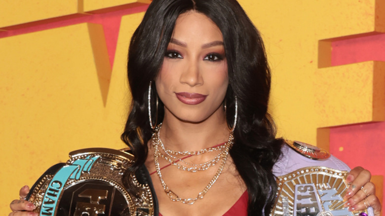 Mercedes mone posing on red carpet