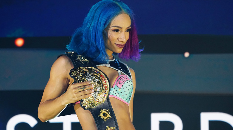 Mercedes Mone showing off the gold