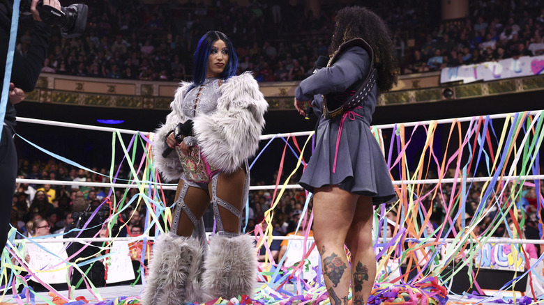 Mercedes Mone stares down AEW Women's World Champion Willow Nightingale in a ring full of streamers, during Nightingale's championship victory celebration, on the July 29, 2026 edition of 