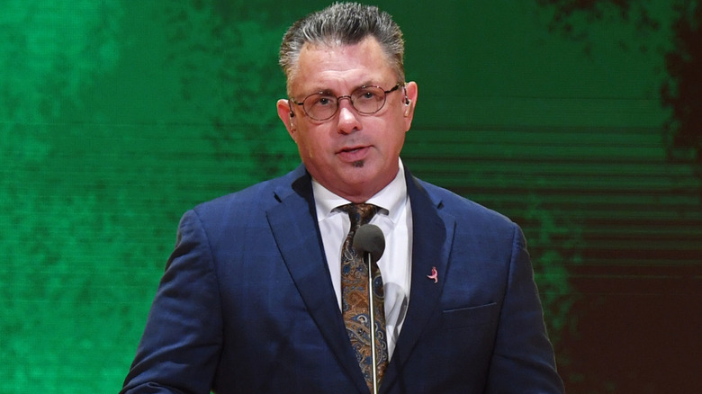 Michael Cole wearing glasses