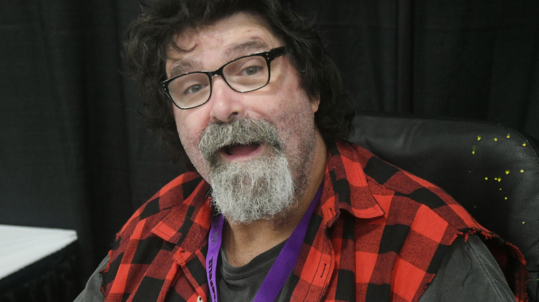 Mick Foley speaking at a convention