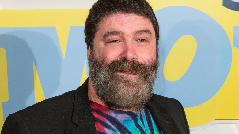 Mick Foley smiling on the red carpet