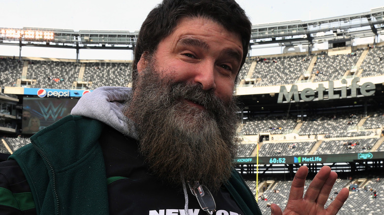 Mick Foley smiling NFL game