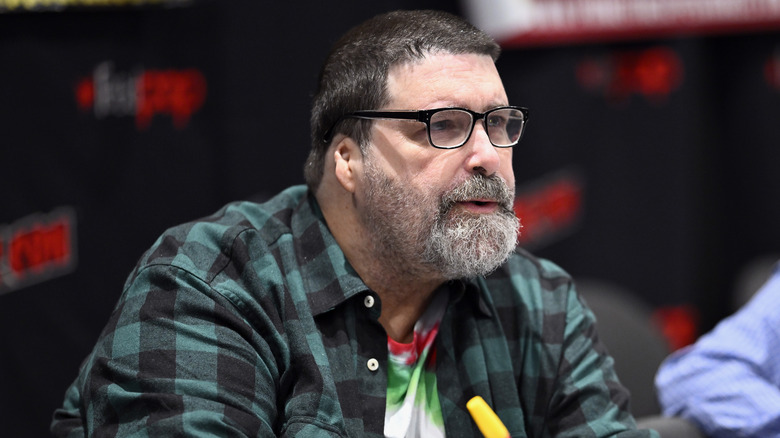 Mick Foley startled by a question at an autograph signing