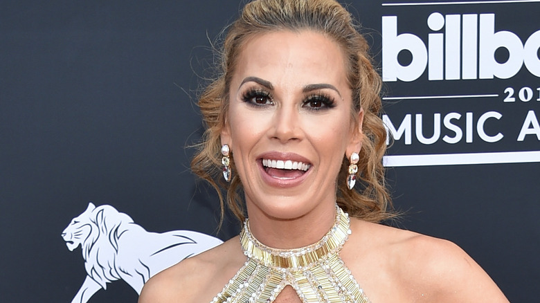 Mickie James smiling on the red carpet