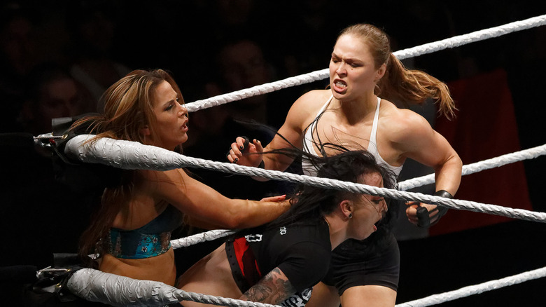 Mickie James, Ronda Rousey Ruby Riott wrestling