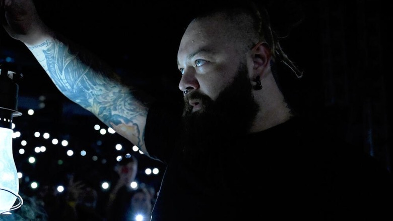 Bray Wyatt carrying lantern 