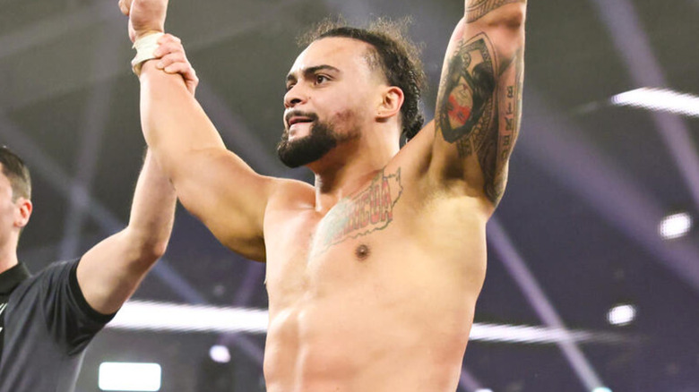 TNA star Mike Santana raising his arms