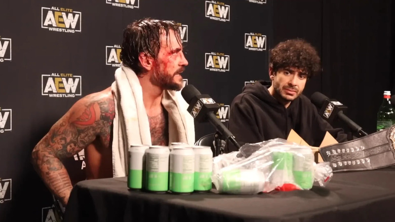 CM Punk and Tony Khan at the AEW All Out 2022 Media Scrum