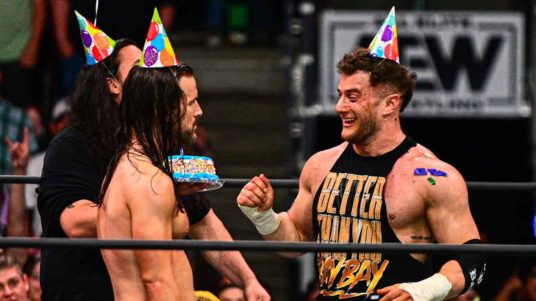 MJF and Adam Cole in party hats
