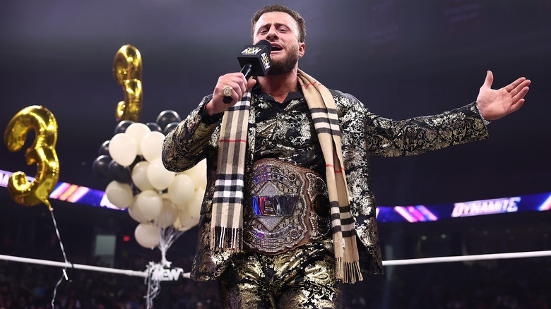 MJF celebrating his third championship reign with the AEW World Championship on "AEW Dynamite."