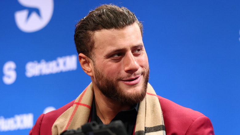 MJF showing off his hair