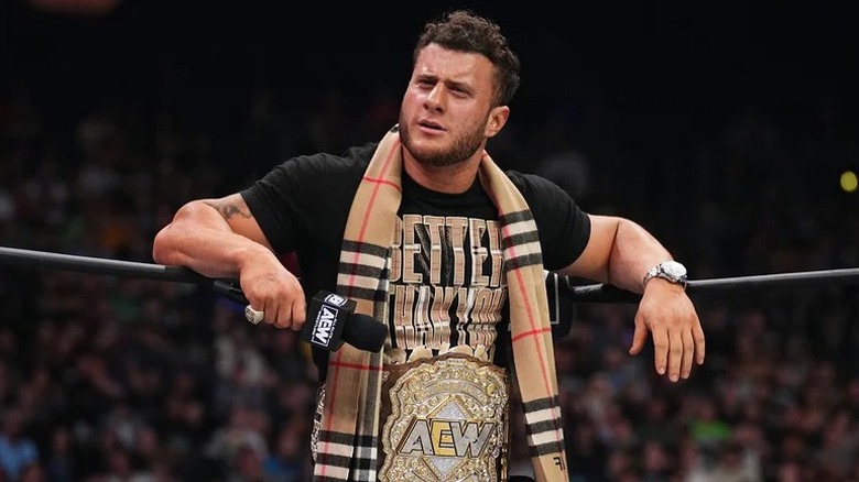 AEW World Champion MJF looks perplexed at what's being said to him in the ring
