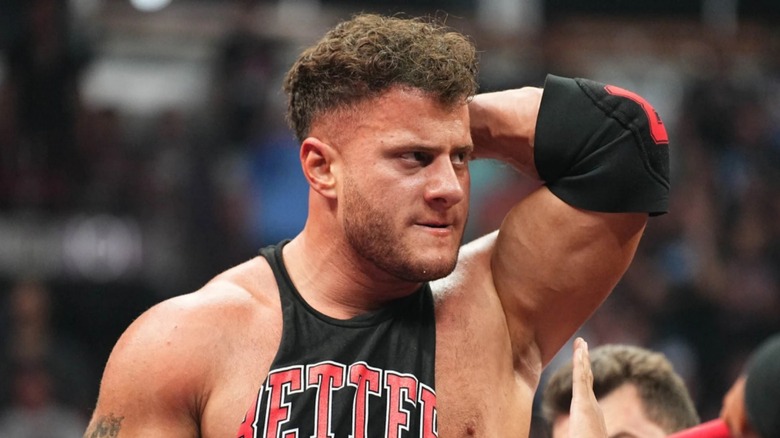 MJF grimacing at both his neck pain and the thought of wrestling a singles match at WrestleDream