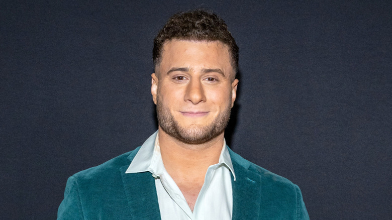 MJF wearing a teel jacket at the Iron Claw premiere