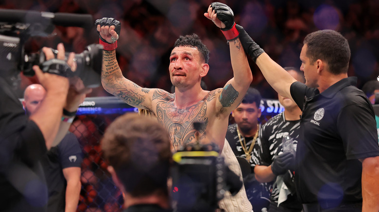 Max Hollway celebrates BMF title defense