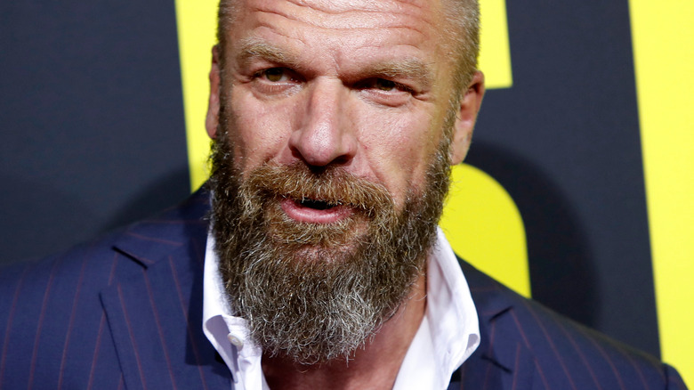 Triple H posing at a promotional event 