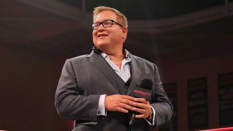 Former Impact/TNA President Scott D'Amore takes in the admiration from the crowd