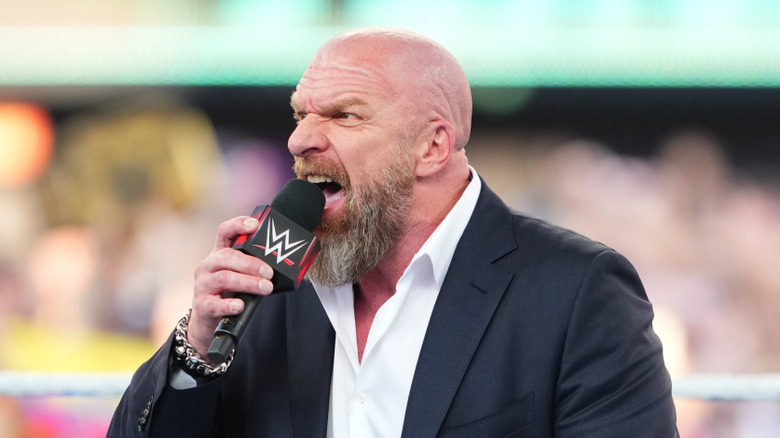 Triple H screams very loudly