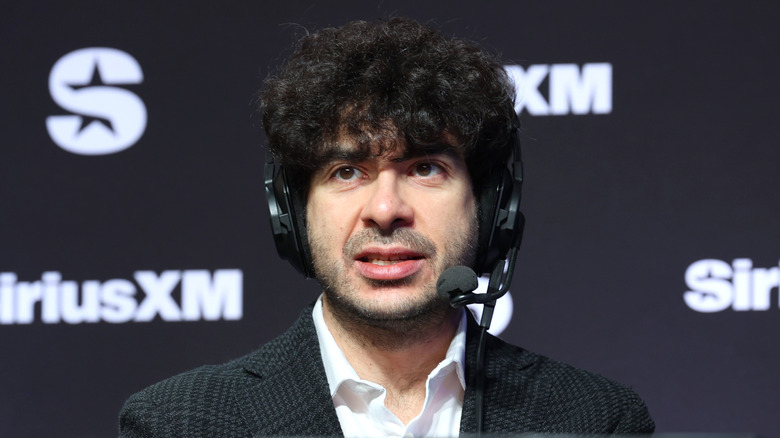 AEW owner Tony Khan on the headset