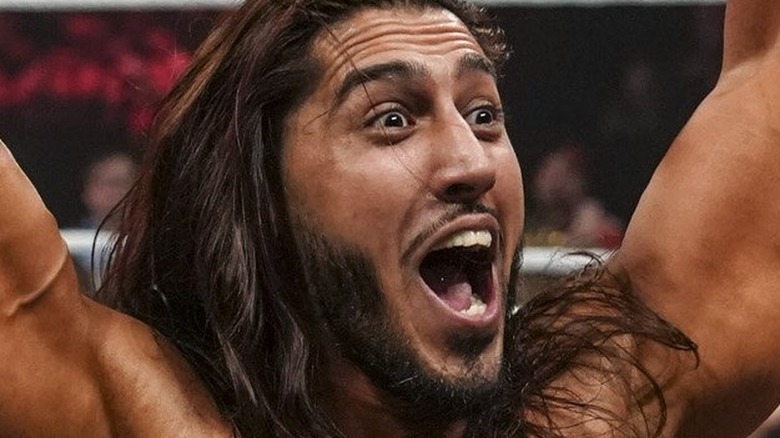 Mustafa Ali celebrating