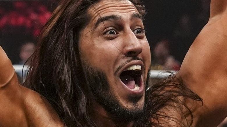 Mustafa Ali celebrating