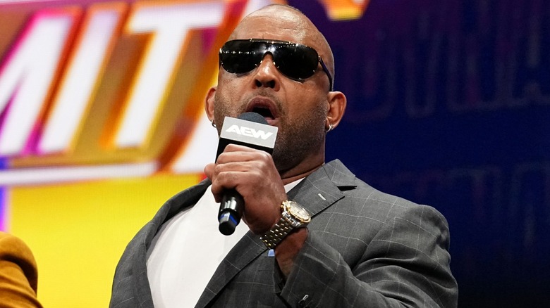 MVP addressing the Gates of Agony during a promo segment alongside Bobby Lashley and Shelton Benjamin during 