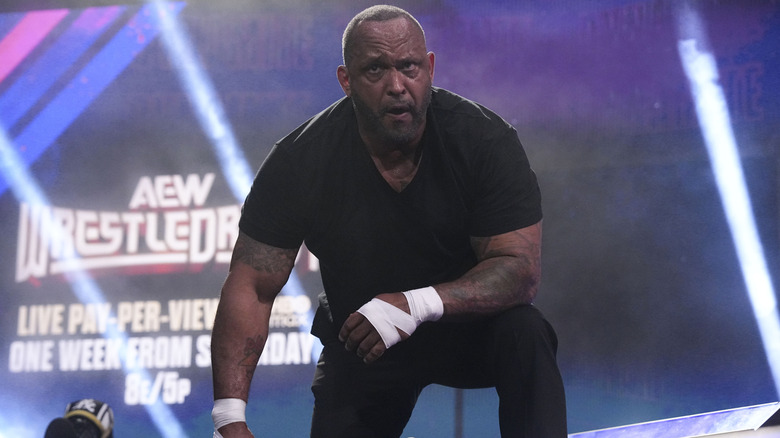 MVP crouches on the stage during the Hurt Syndicate's street fight against The Demand on an episode of 