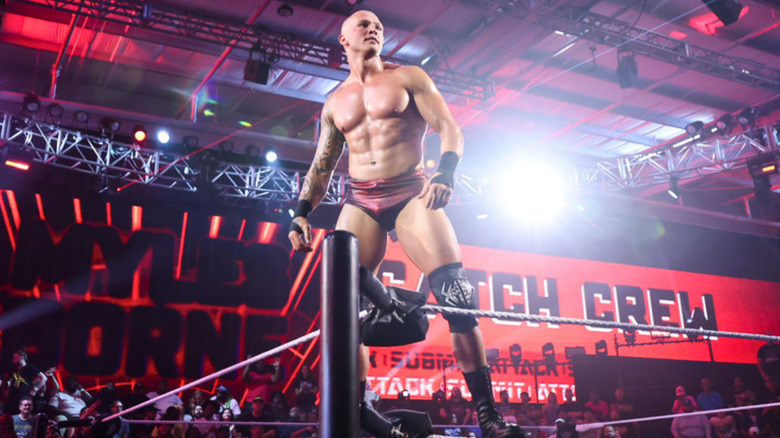 Myles Borne standing on turnbuckle