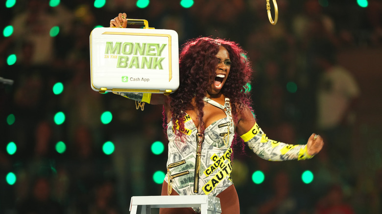 Naomi celebrates winning the Briefcase during WWE Money in the Bank at Intuit Dome on June 7, 2025 in Inglewood, California.