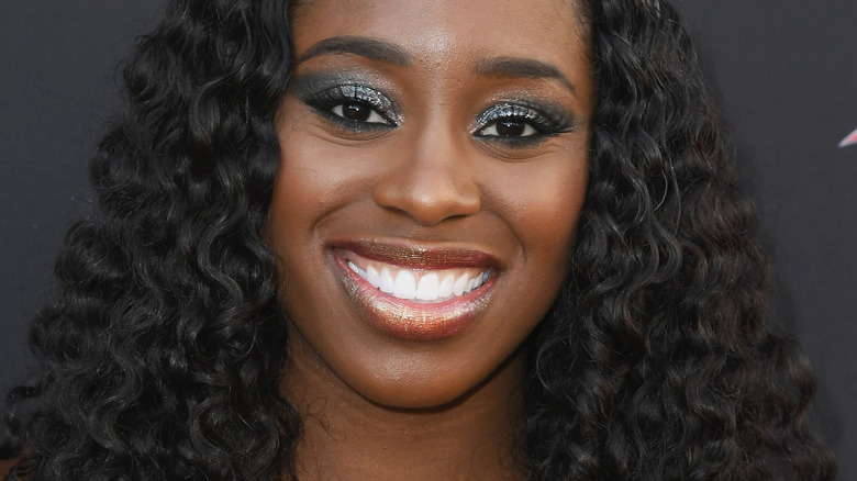 Naomi smiling