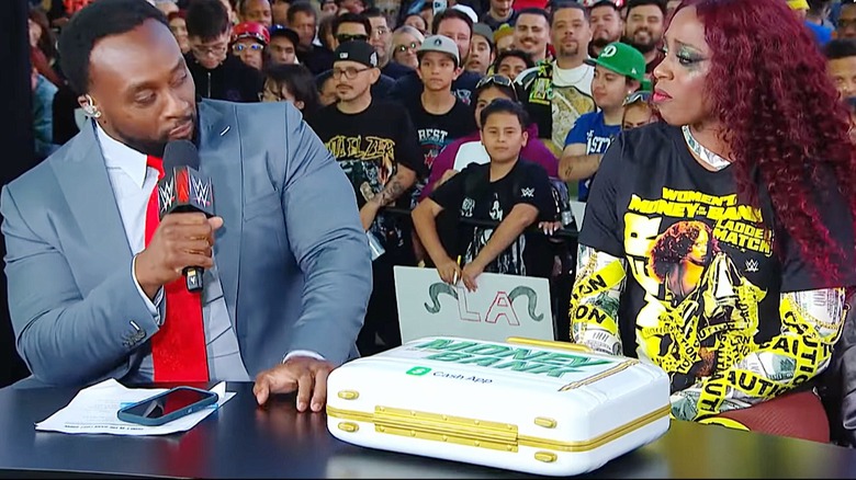 Big E congratulates Naomi after triumphantly winning the 2025 Women's Money in the Bank Briefcase