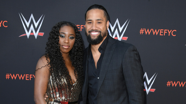 Naomi and Jimmy Uso smiling