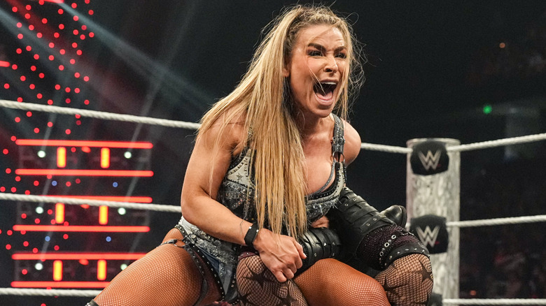 Natalya wraps up the legs of Roxanne Perez into the Sharpshooter.