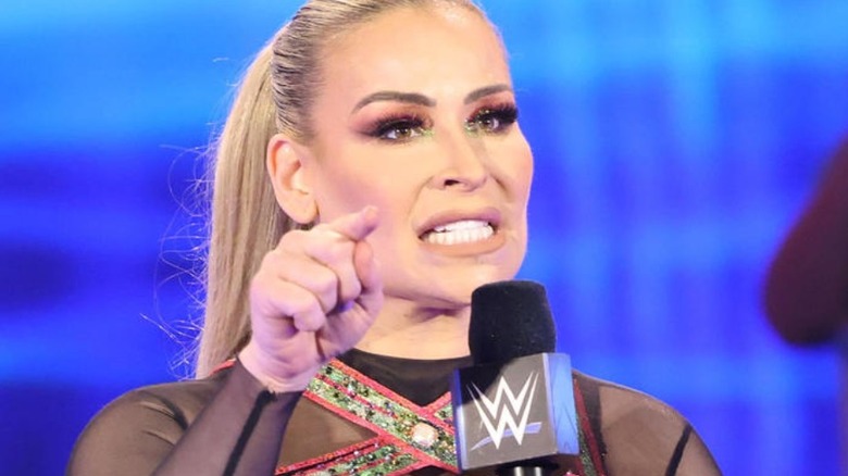 Natalya talking into a WWE microphone