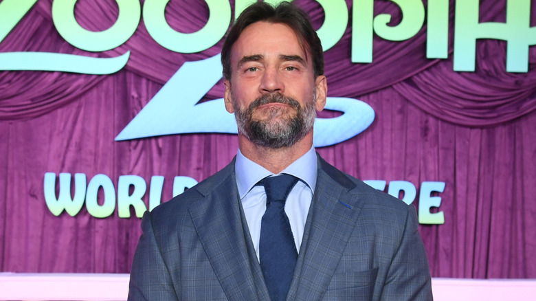 CM Punk wearing a suit