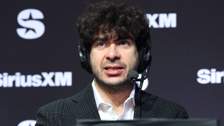 Tony Khan with a headset on