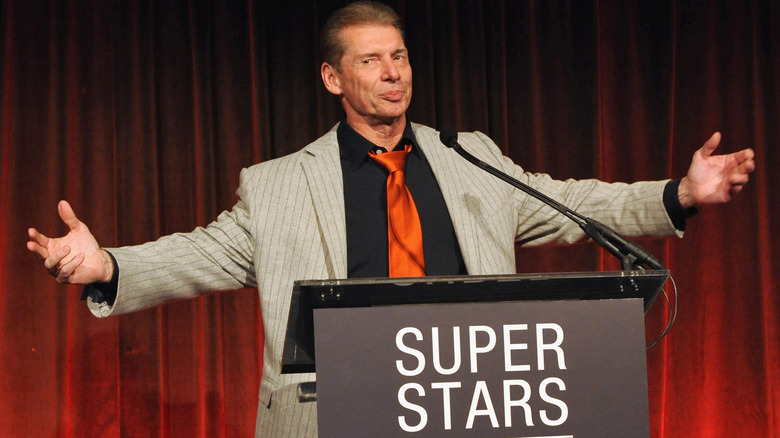 Vince McMahon does big arms