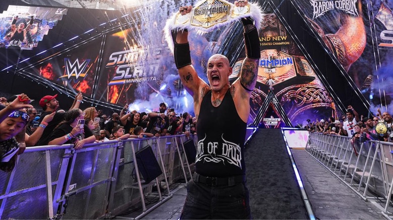 Baron Corbin holds up the United States Championship after his victory over Trick Williams at WWE SummerSlam 2026.