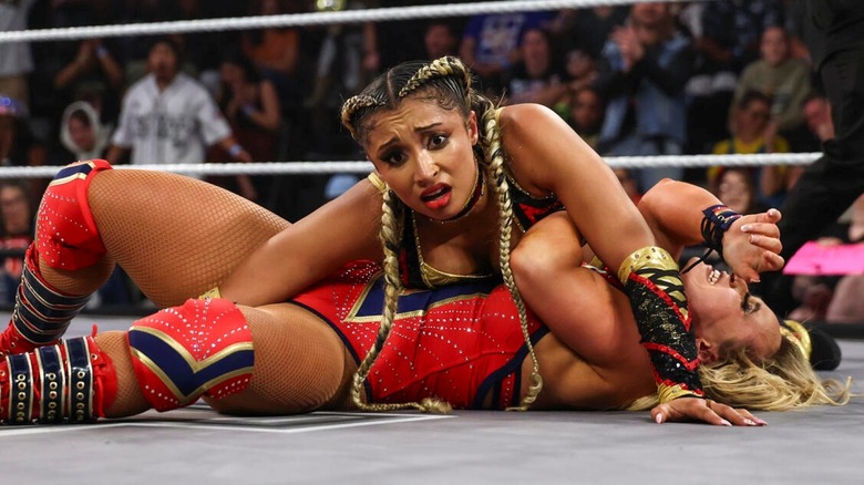 Kelani Jordan goes for a pin in the ring