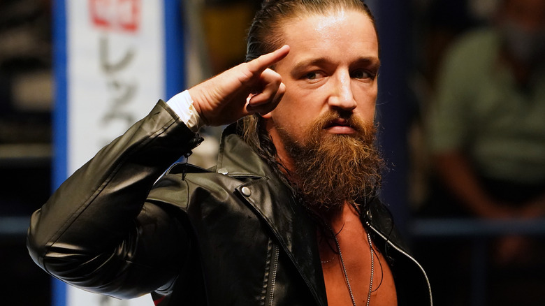 Jay White posing during entrance NJPW