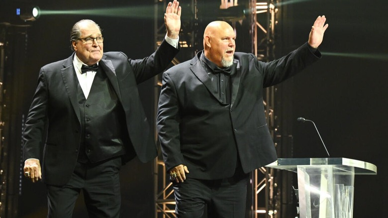 Demolition's Ax (Bill Eadie) and Smash (Barry Darsow) wave towards the crowd after their 2026 WWE Hall of Fame induction